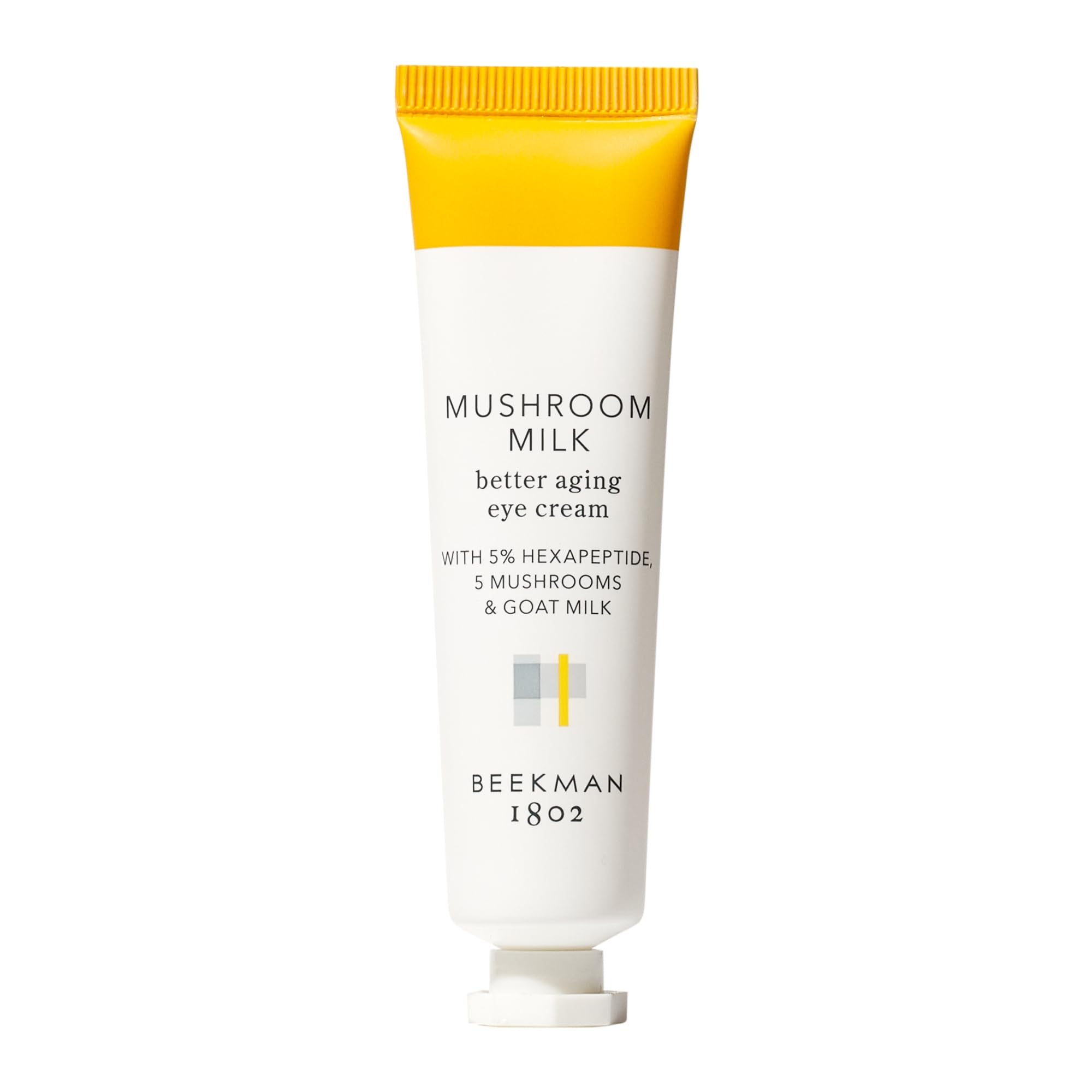 Beekman 1802 Mushroom Goat Milk Eye Cream jar, featuring a creamy texture for under-eye circles and fine line reduction.